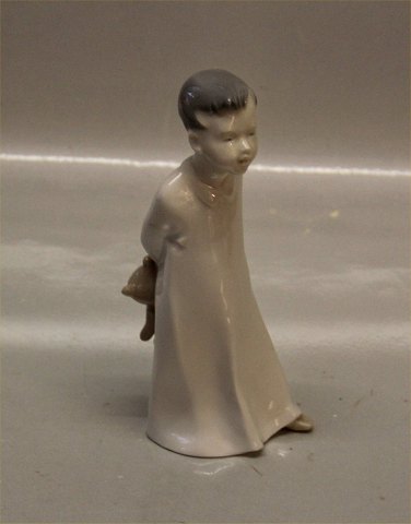 Porcelain figurine boy with teddybear