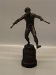 Pan - Dancing Faun in Bronze by Professor Peters on round wooden stand 21 cm
