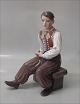Dahl Jensen figur 1300 
Amager dreng med pibe 23,5 cm