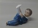 Kgl porcelænsfigur 3580 Dreng liggende på ryggen i pyjamas 6 x 15 cm