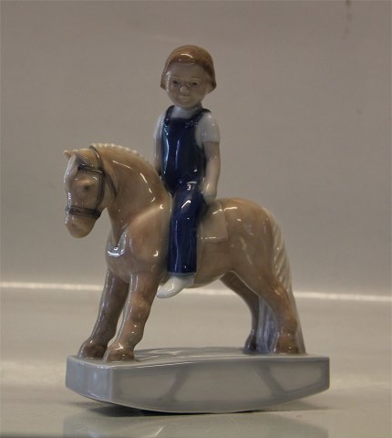 Royal Copenhagen figurine 5651 RC Girl on Rocking Horse 17 x 13 cm