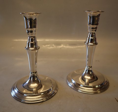 Pair of Silver candlestick Danish Silver smith Svend Toksvaerd 16 cm Marked 830 
S and  Sv.T Foot filled with plaster