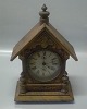 Old wooden Junghans mantel clock with bronze / brass mounting