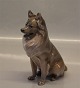 Royal Copenhagen figurine 0977 -1238 RC Brown Spitz - Siberian Husky ? AP/AN 18 
x 17 cm