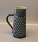 Pitcher with handle -
 Vase 19 cm aces in harlequin  - not the tradftional flowers of Azur Nissen 
Kronjyden B&G Quistgaard  Stoneware