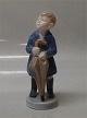 Royal Copenhagen figurine of the month 4526 April - boy with umbrella
