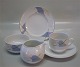 Orchid BLUE B&G porcelain 
B&G Blue: White base, blue orchid (also with green border)